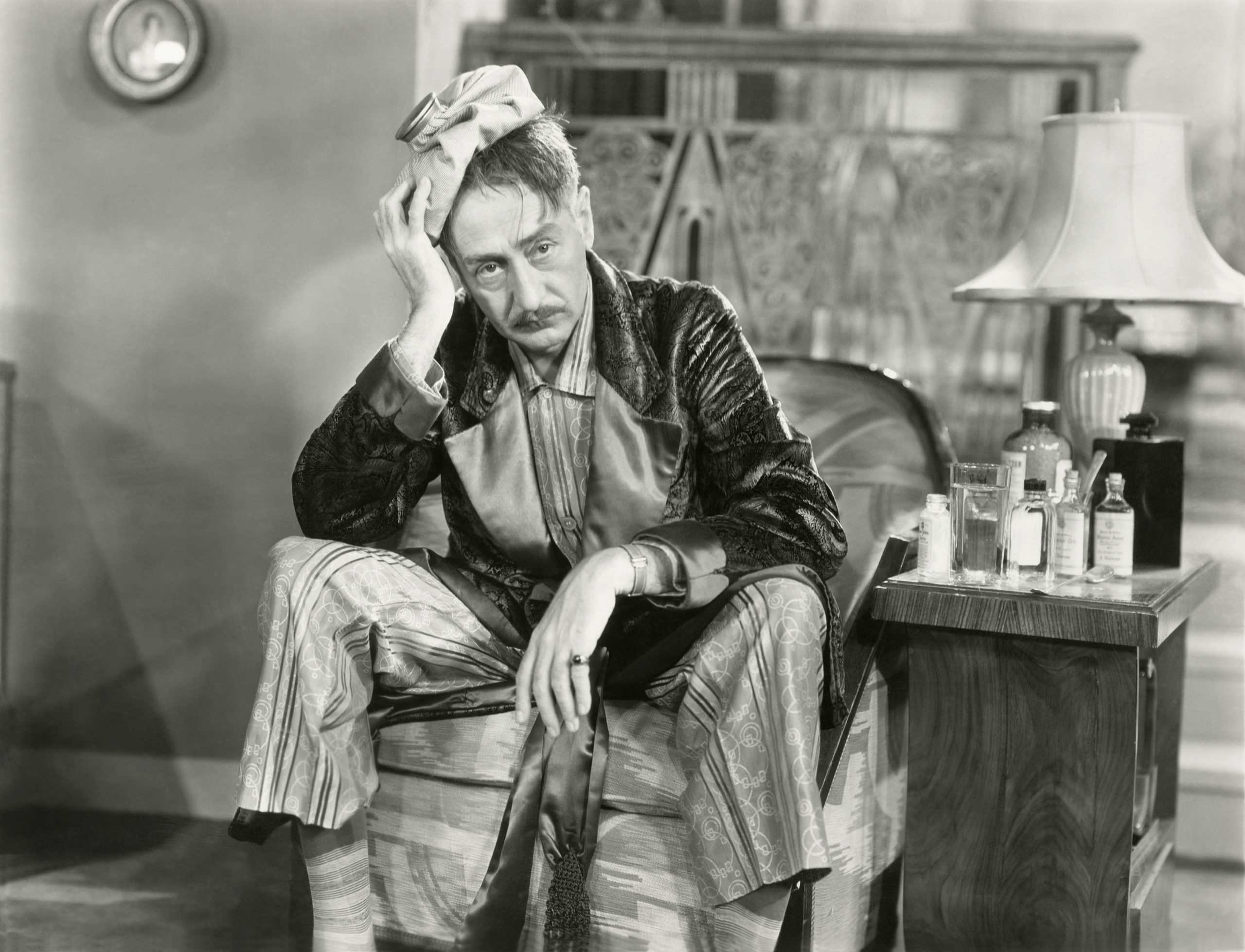 man with ice pack on head